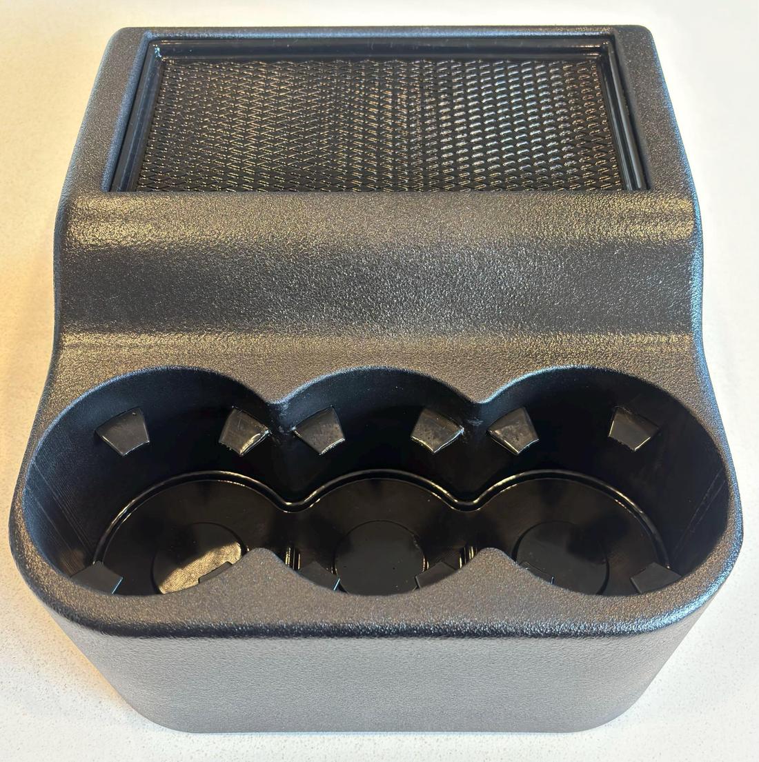 C5 cupholder top view with rubber mat and tabs