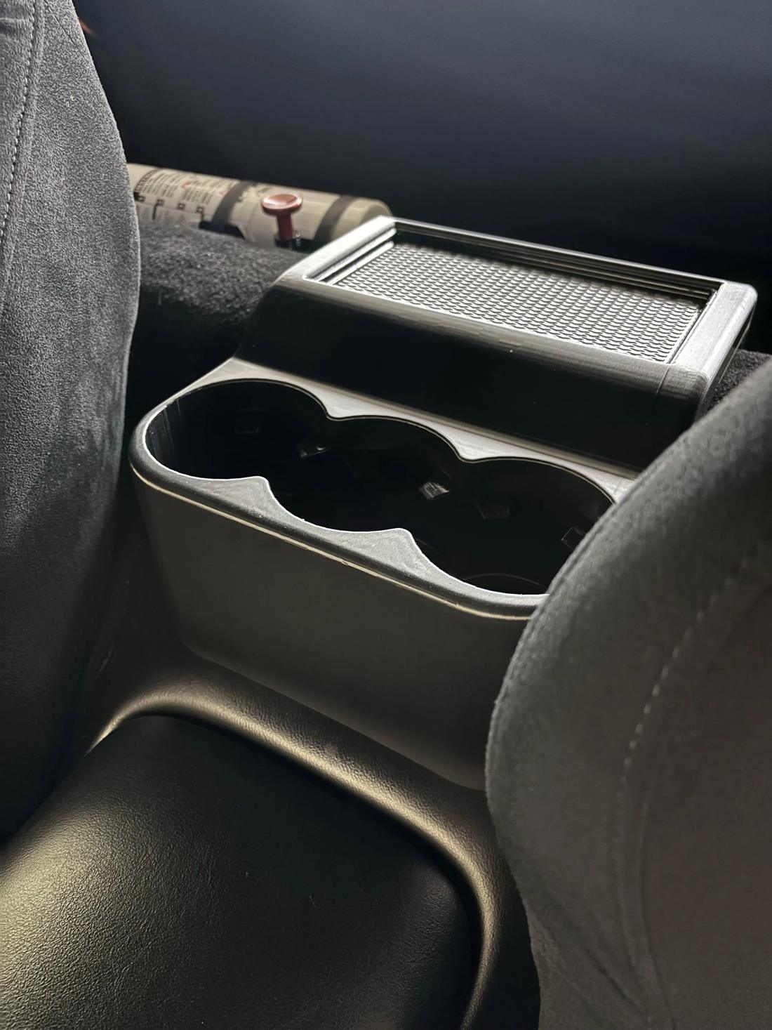 Unfinished C5 cupholder installed in the car