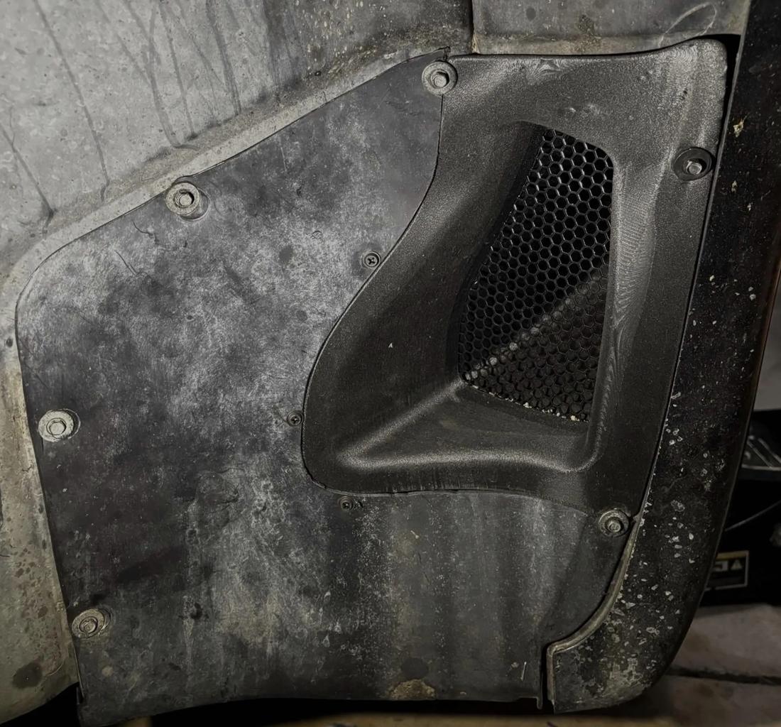 Duct installed in the wheel well liner