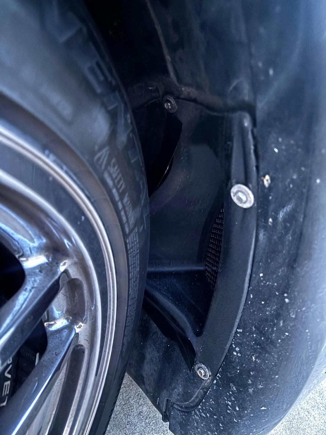 Installed duct seen through the wheel