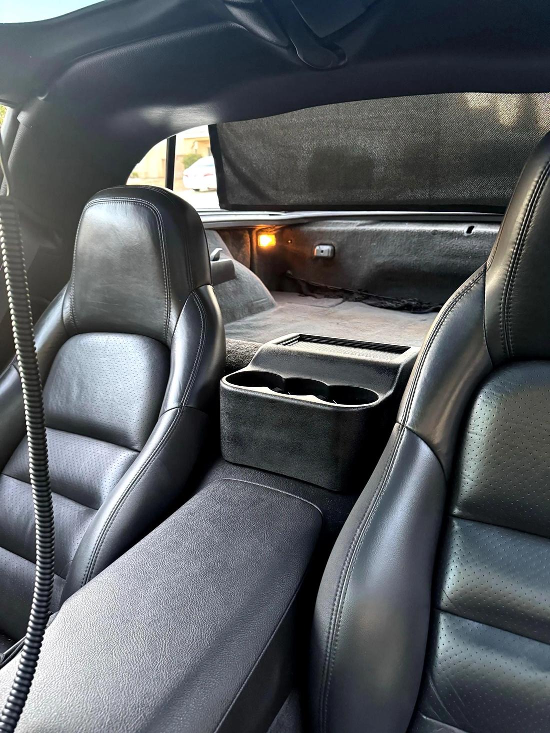 C6 cupholder installed, seen from the door