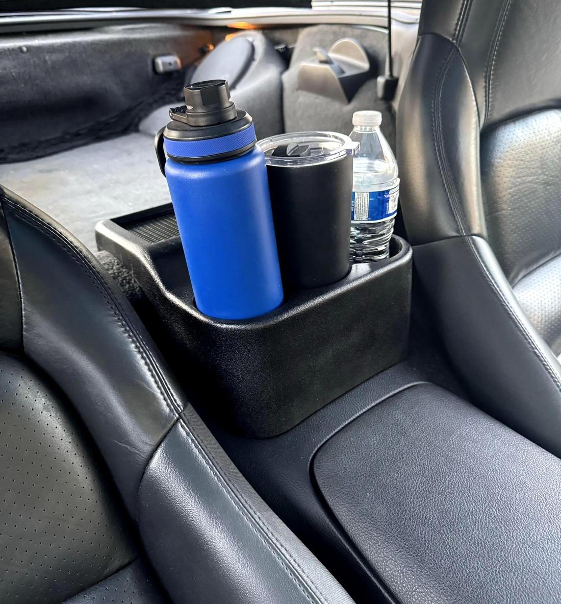 Bottles and a tumbler in the C6 cupholder